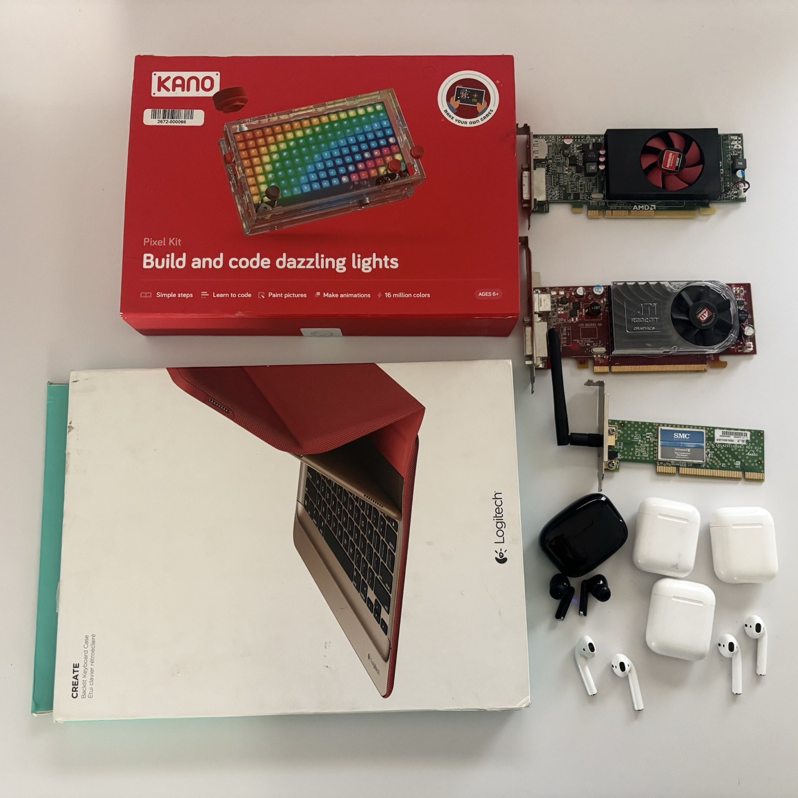 Tech Electronics Liquidation Lot: Apple Air Pods Gen 1, AMD GPU, iPad Keyboard