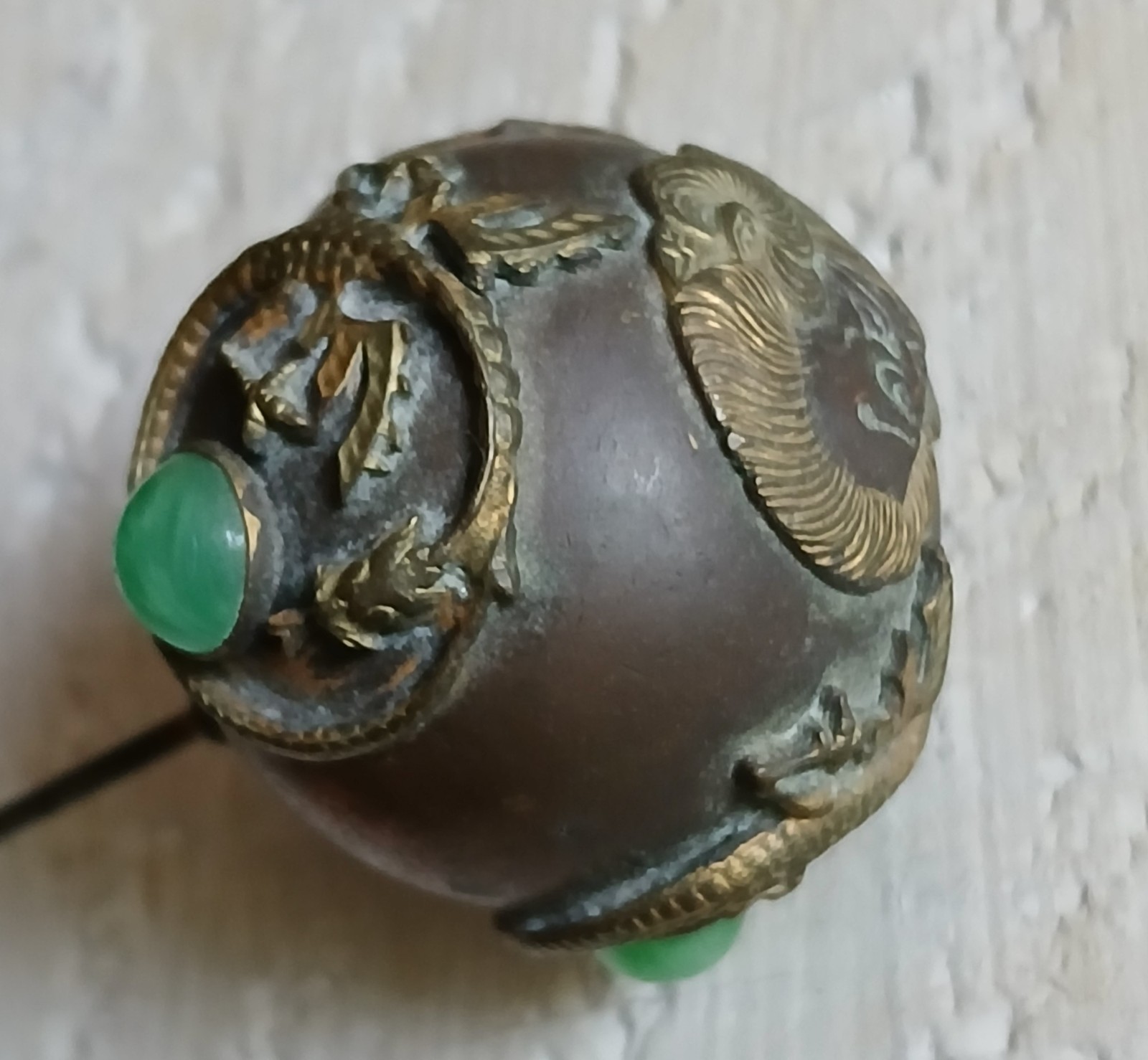 Art Nouveau Asian Mask Figural Hat Pin Bronze Green Glass Cabochon Pin is 7.5"