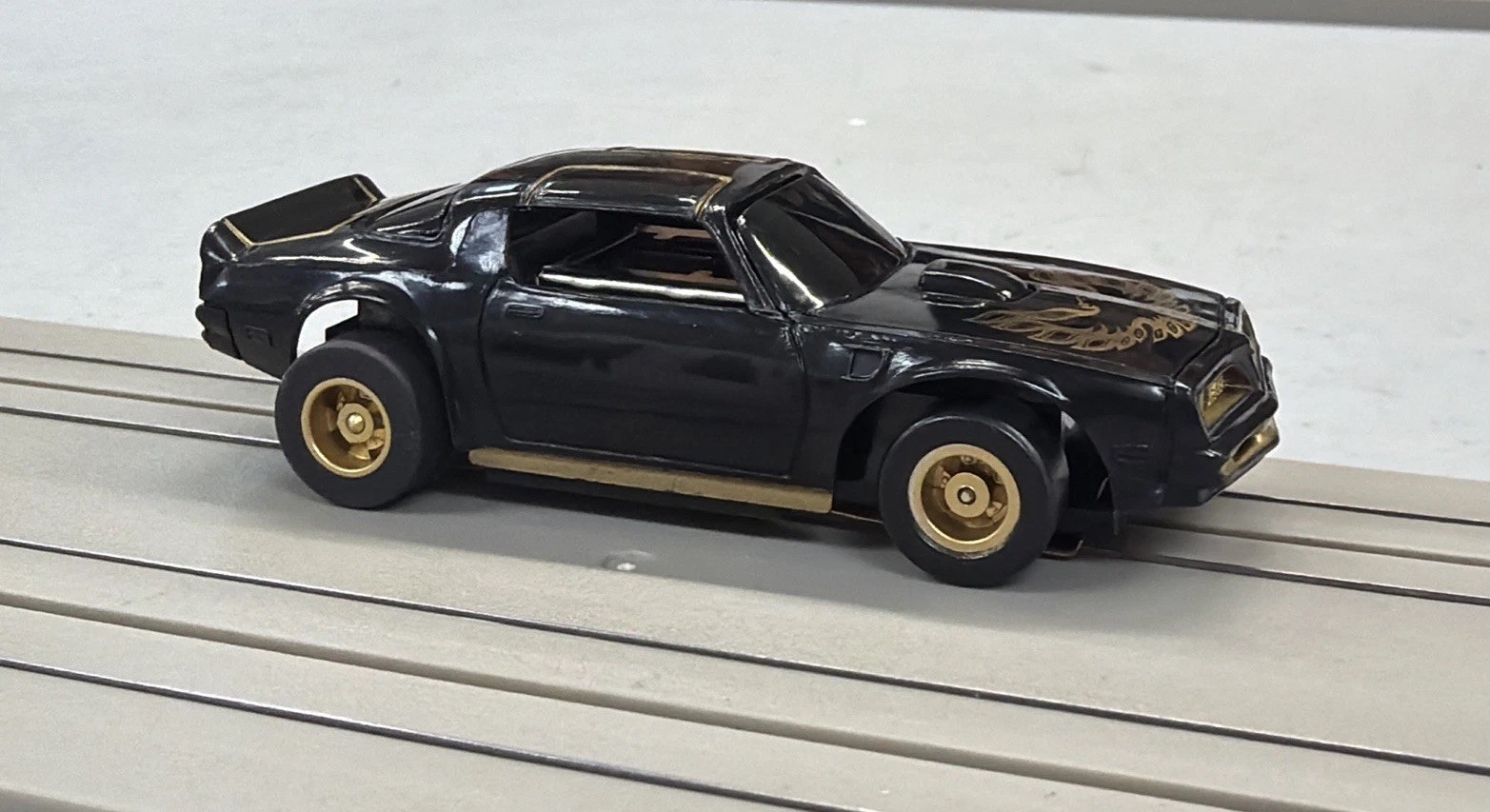 Black Trans Am on a Reconditioned Tyco US1 Electric Trucking Chassis