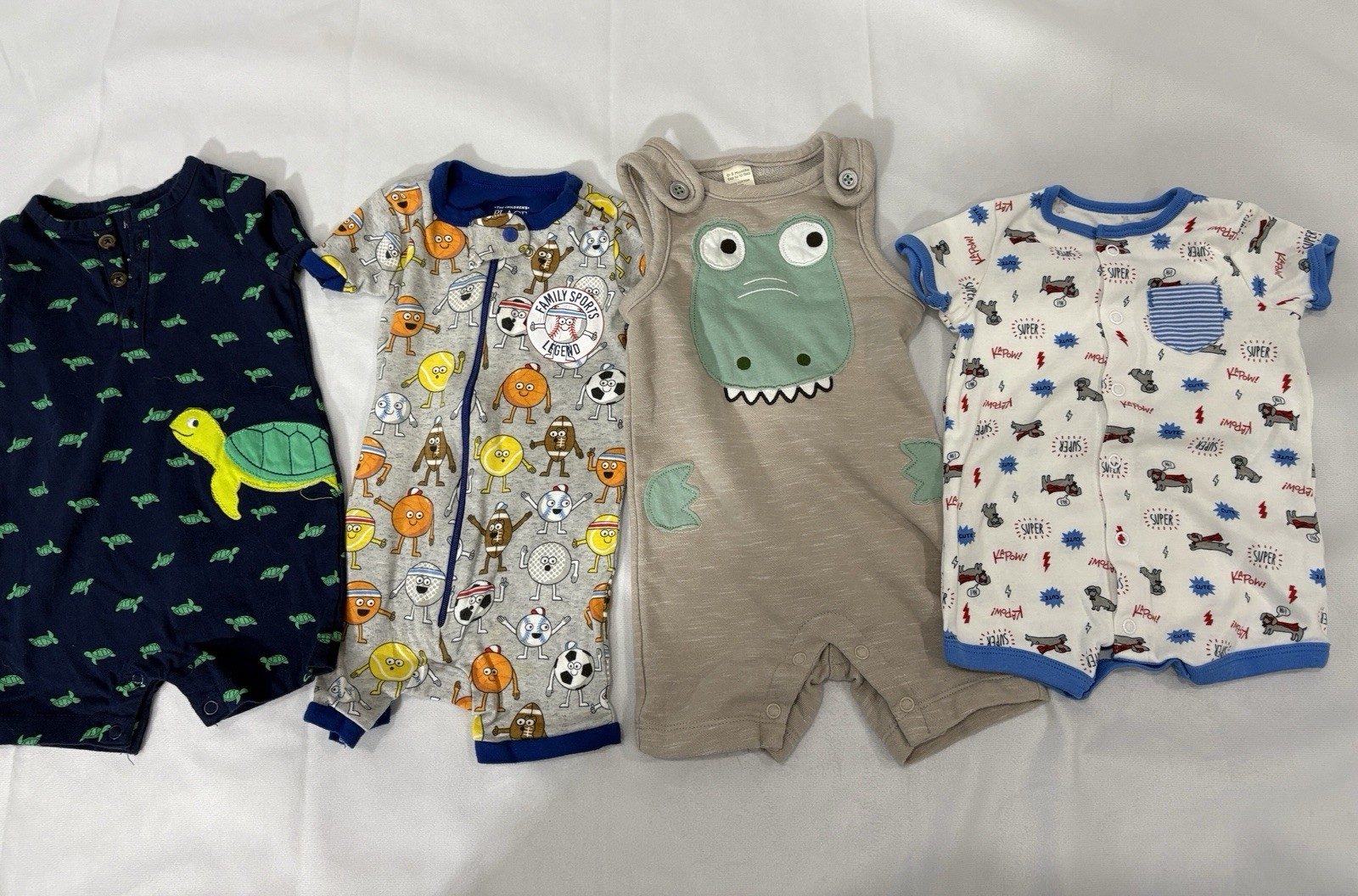 Set of 4 Rompers Baby Boy Size 3 Months.  Great Used Condition.