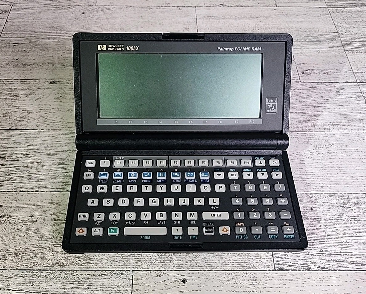 Vintage HP Hewlett-Packard 100 LX Palmtop PC 1MB RAM Handheld Singapore 1992
