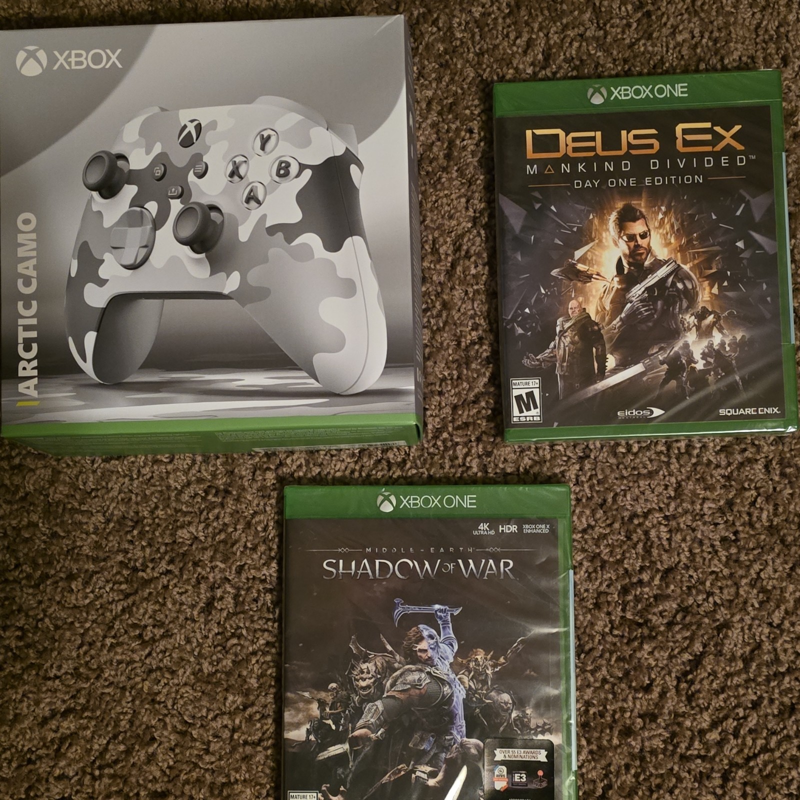 Microsoft xbox controller artic camo and 2 new games.