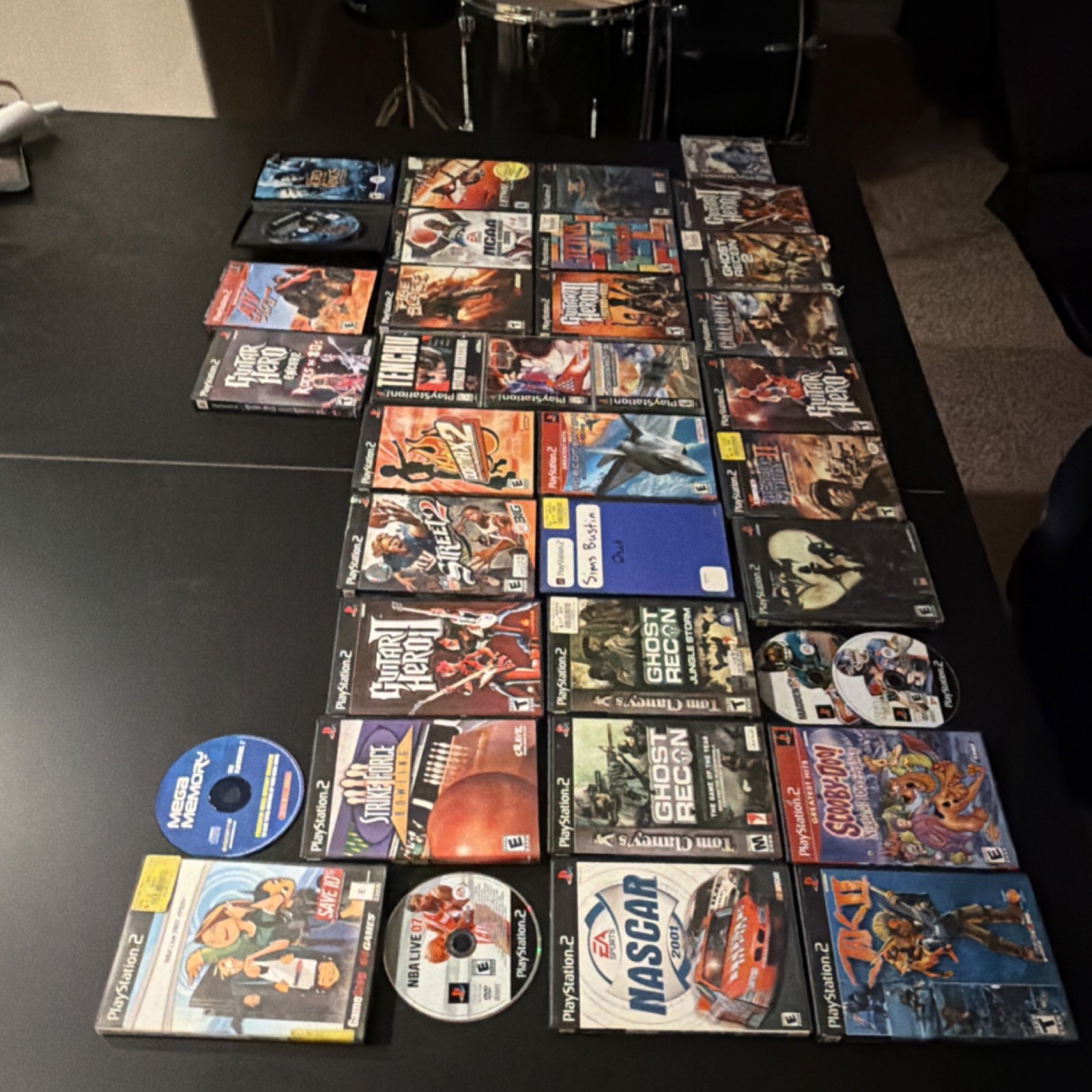 PlayStation 2 Game Lot - Guitar Hero, Scooby-Doo, Madden, Racing, Action