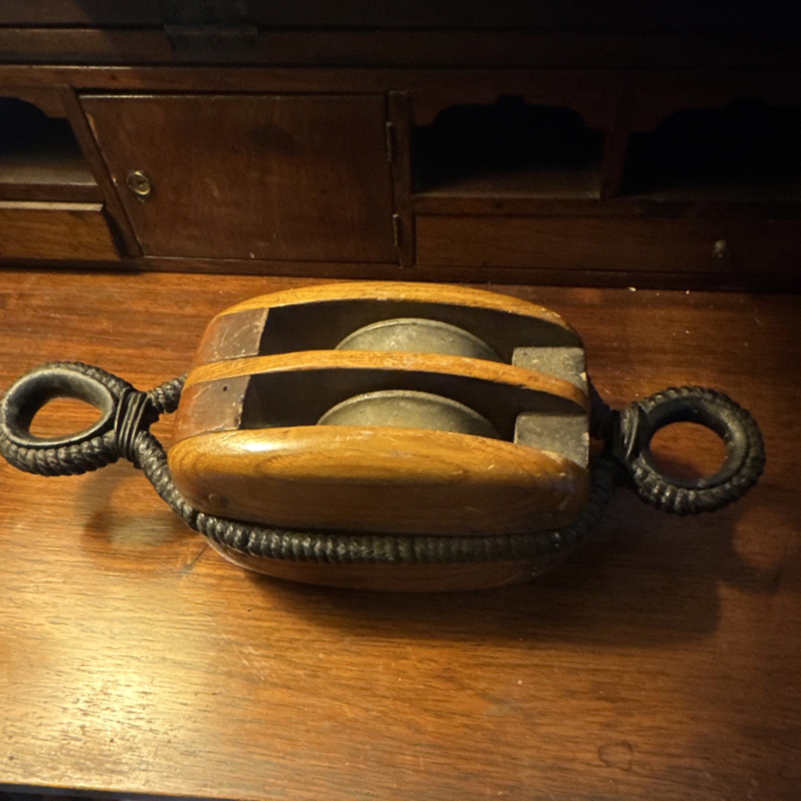 Antique Maritime Wooden and Iron Double Pulley with Rope-Wrapped Metal Eyes