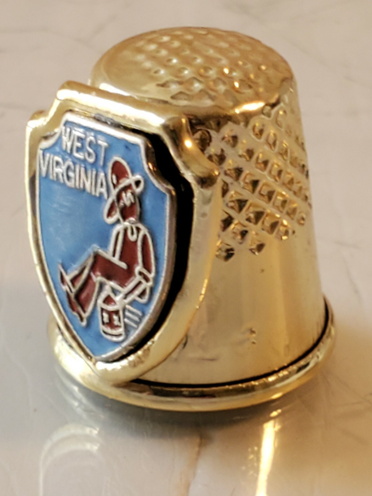 Vintage West Virginia moonshine thimble gold toned box6