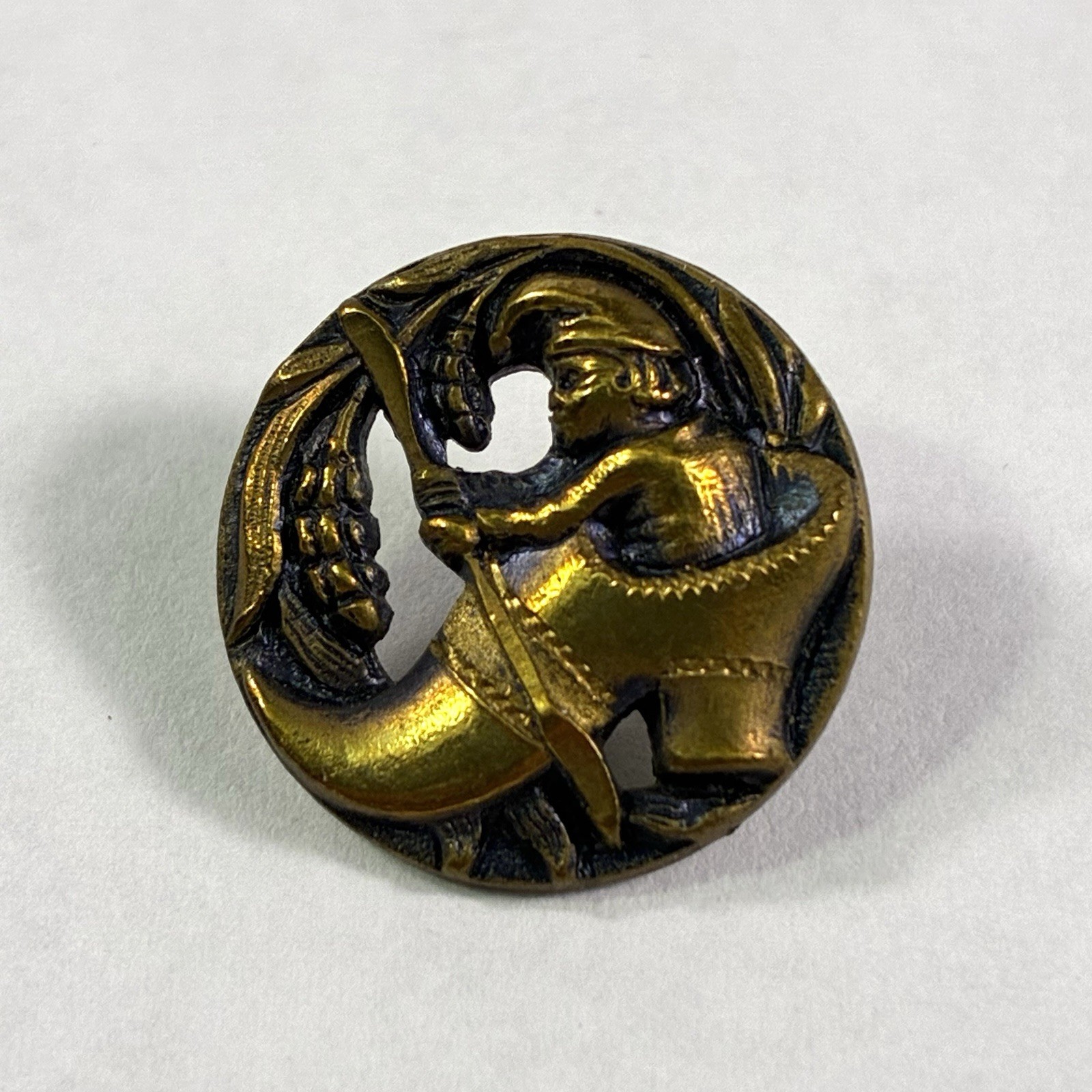 Antique 19c Brass Metal Picture Pierced Button Elf Gnome Rowing a Shoe .66" Vtg.