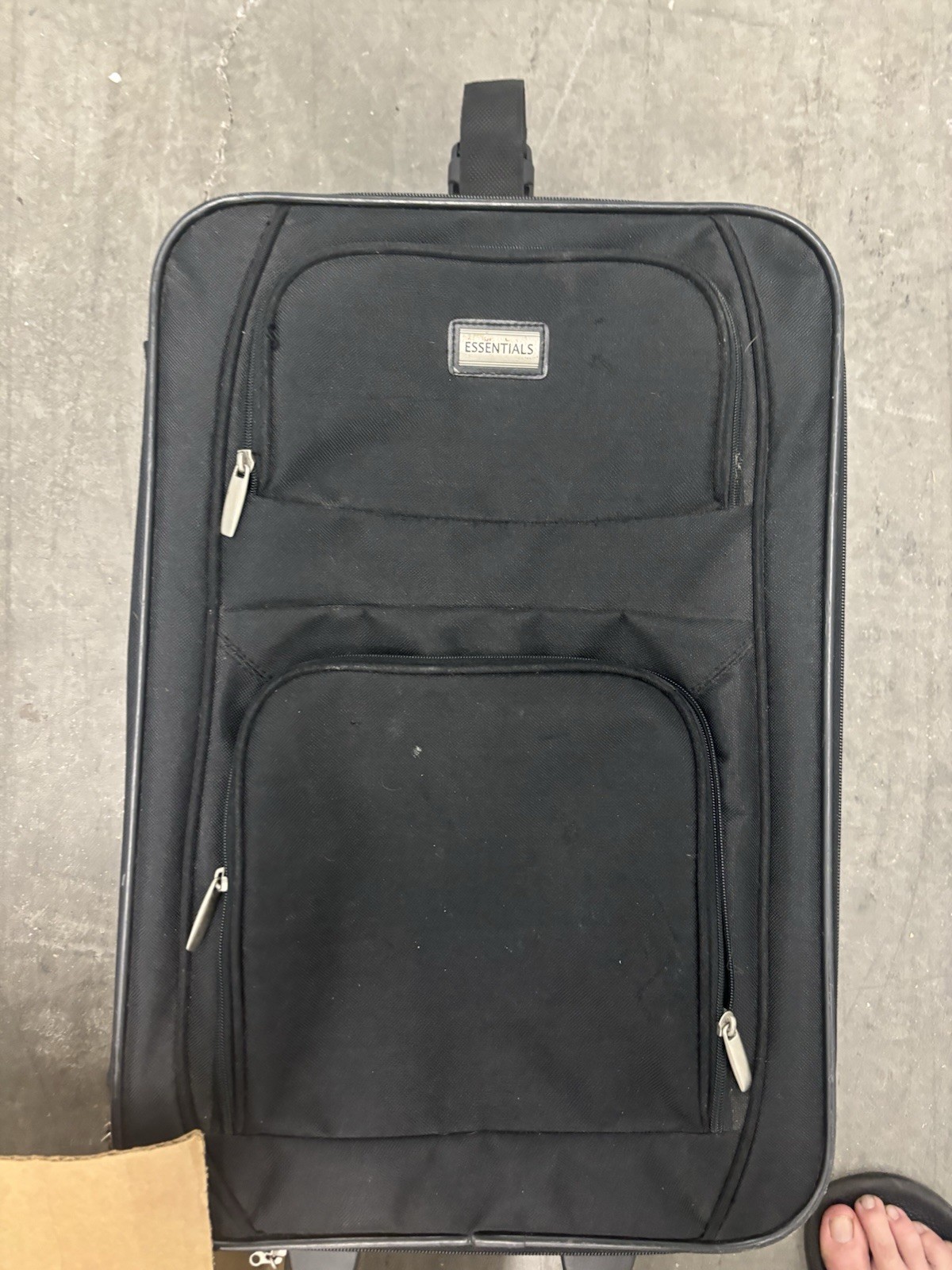 ESSENTIALS Black Suitcase with Retractable Handle, Wheels, Front Zip Pocket