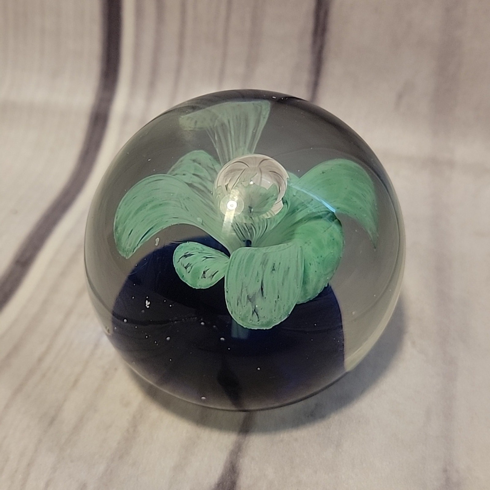 Glass globe flower paper weight