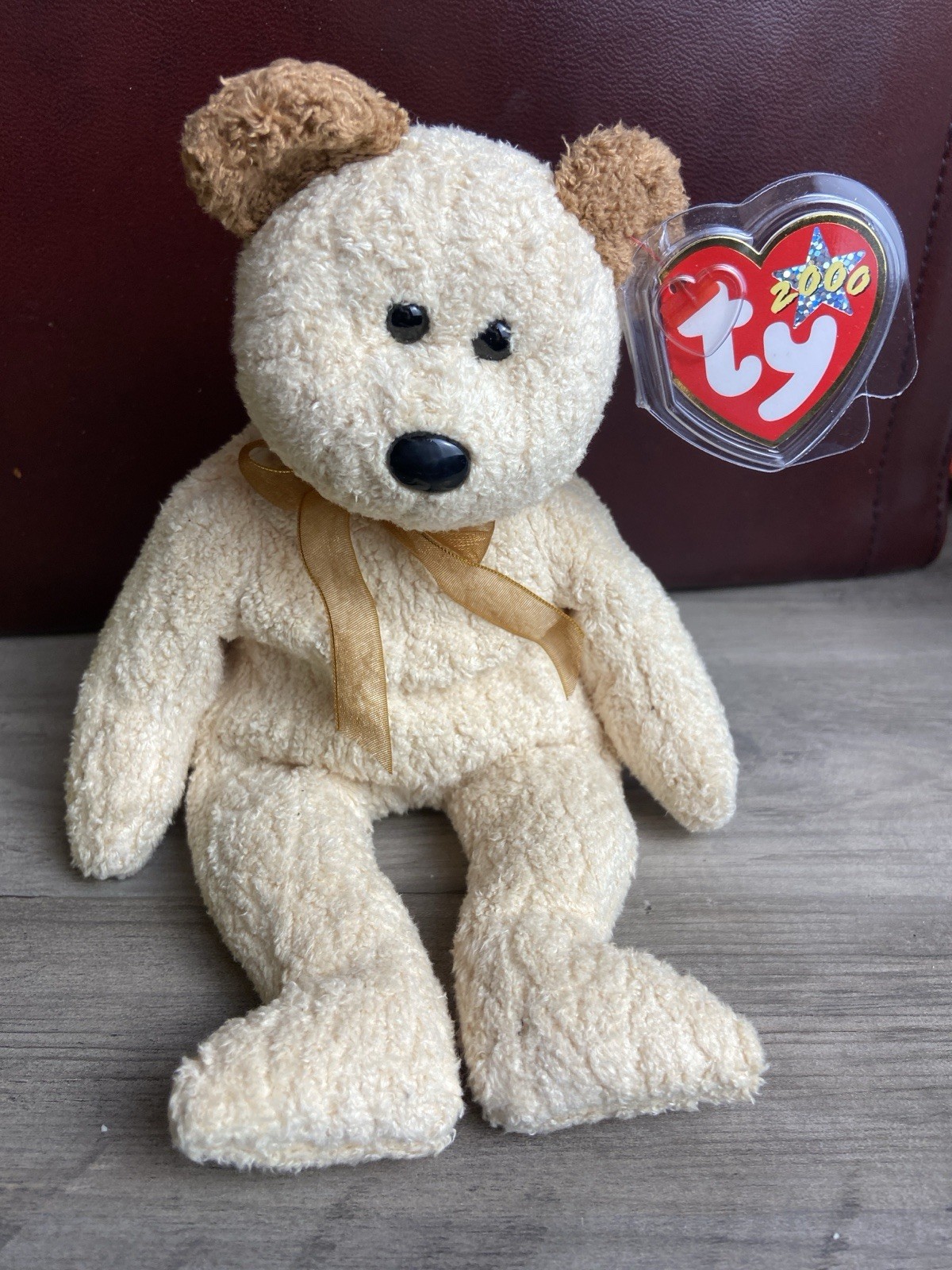 Ty Beanie Baby named Huggy the Bear, released in 2000, NWT