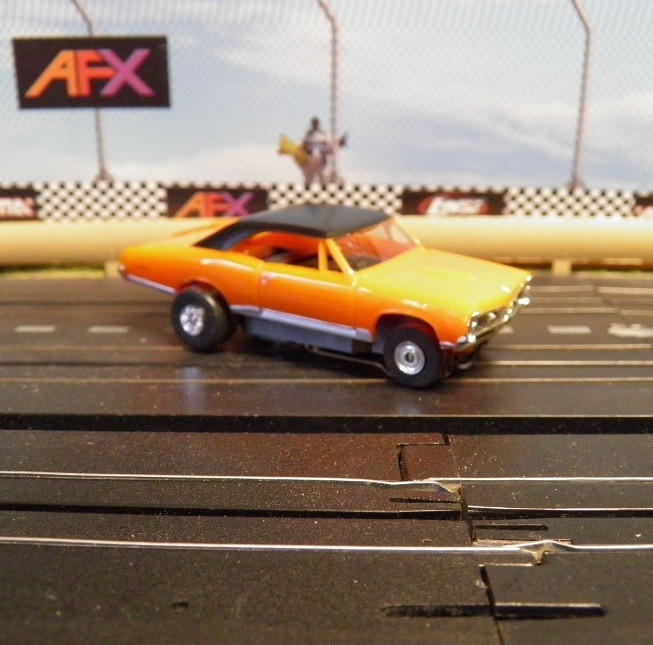 Model Motoring used 1999 Orange/ Black 1967 Pontiac GTO. Runs really good.