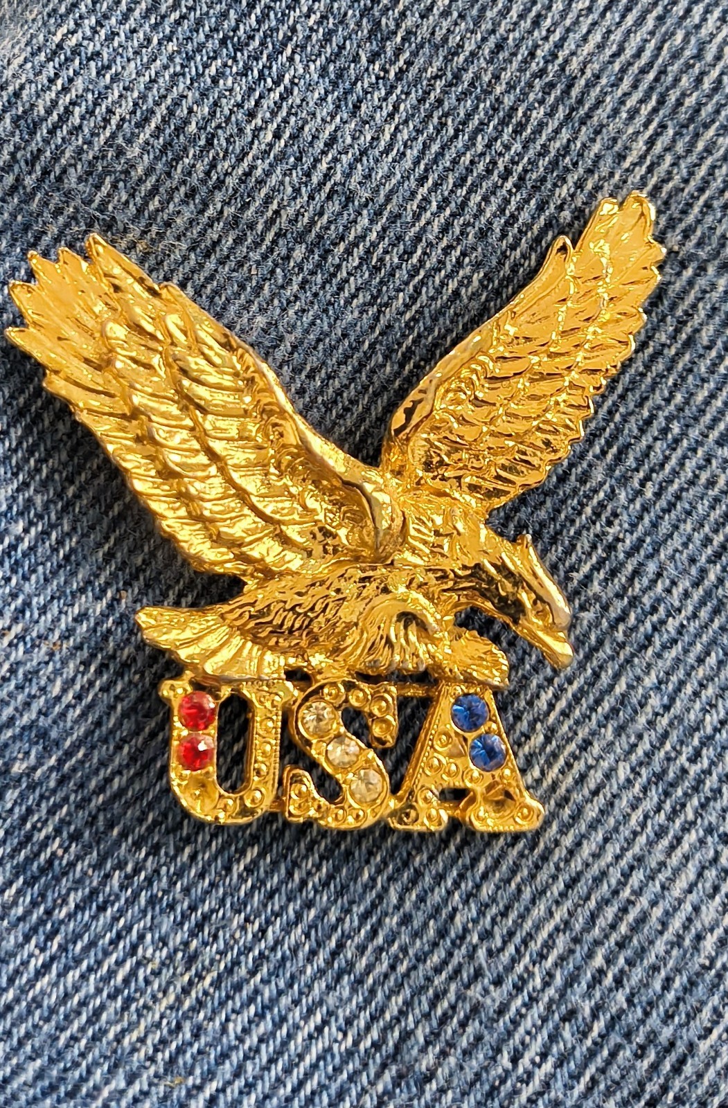 Gold Toned Eagle Pin With Red White And Blue Stones 