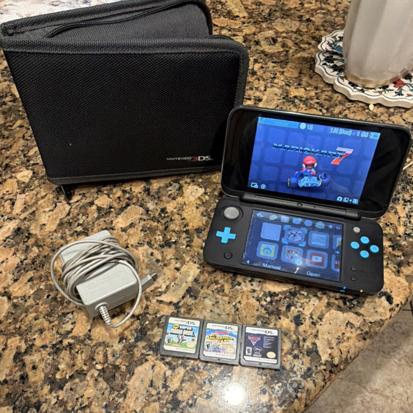 Nintendo 3DS XL Console w/Charger, Case, Pre-Installed Mario Cart 7, and more