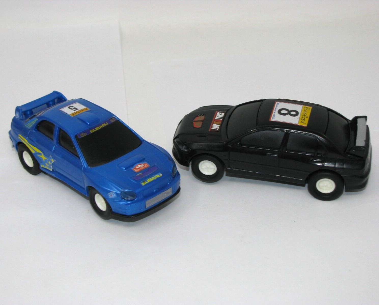 Lot of 2 Slot Cars Lineltex: Black 8 & Blue 5 Subaru w/Headlights Works