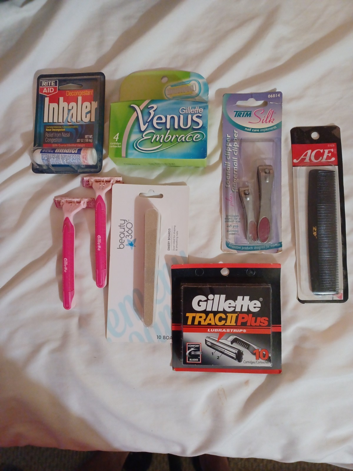 Bathroom Junk Drawer  Razor Refills, 10 emory boards. comb, 2 nail clippers