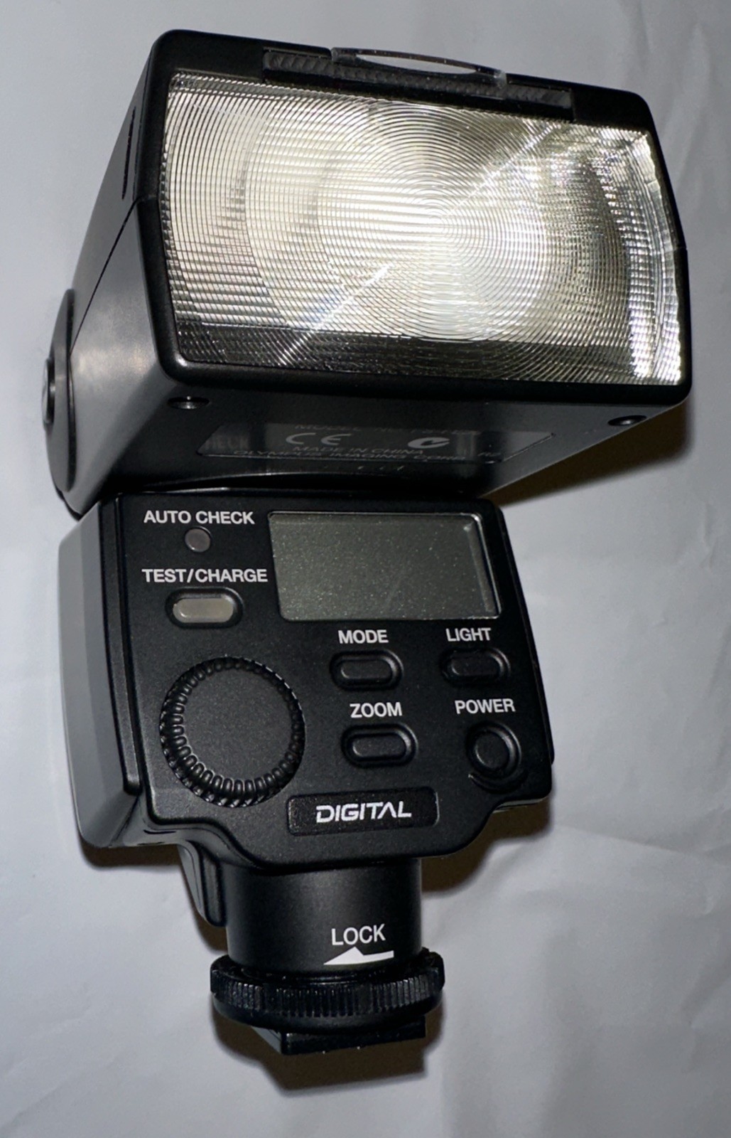 Compact TTL shoe-mount flash for Olympus Four Thirds & Micro Four Thirds Camaras