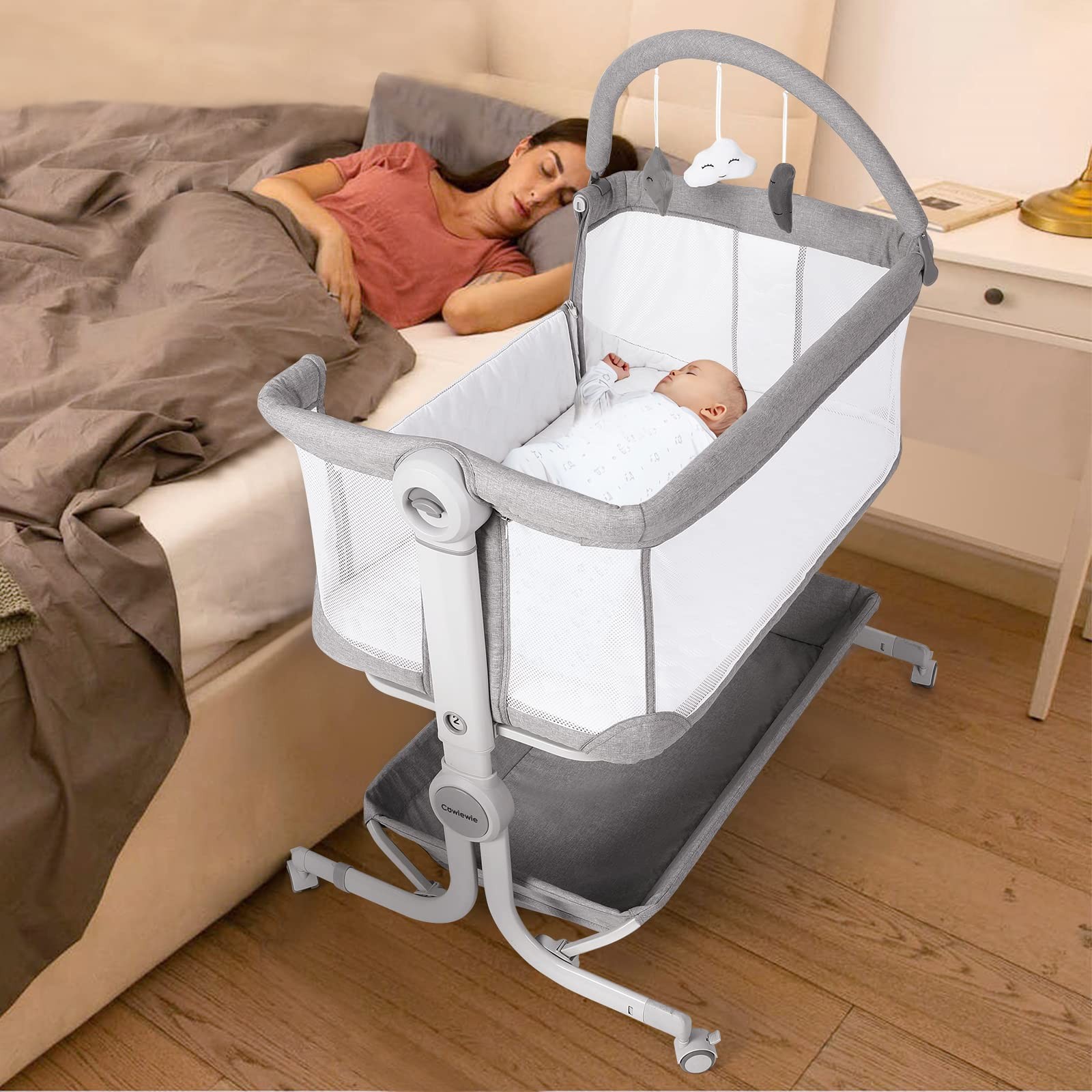 Baby Bassinet Bedside Sleeper with Storage Basket,Wheels & Hanging Toys, Easy...