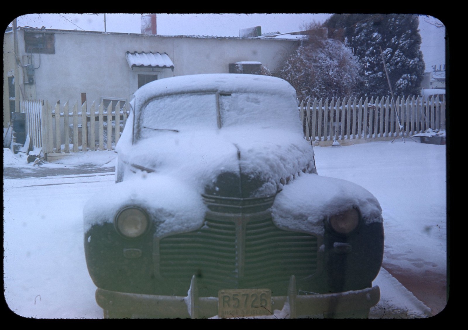 sl28 Original slide 1950’s Red Kodachrome snow covered Chevy car 705a