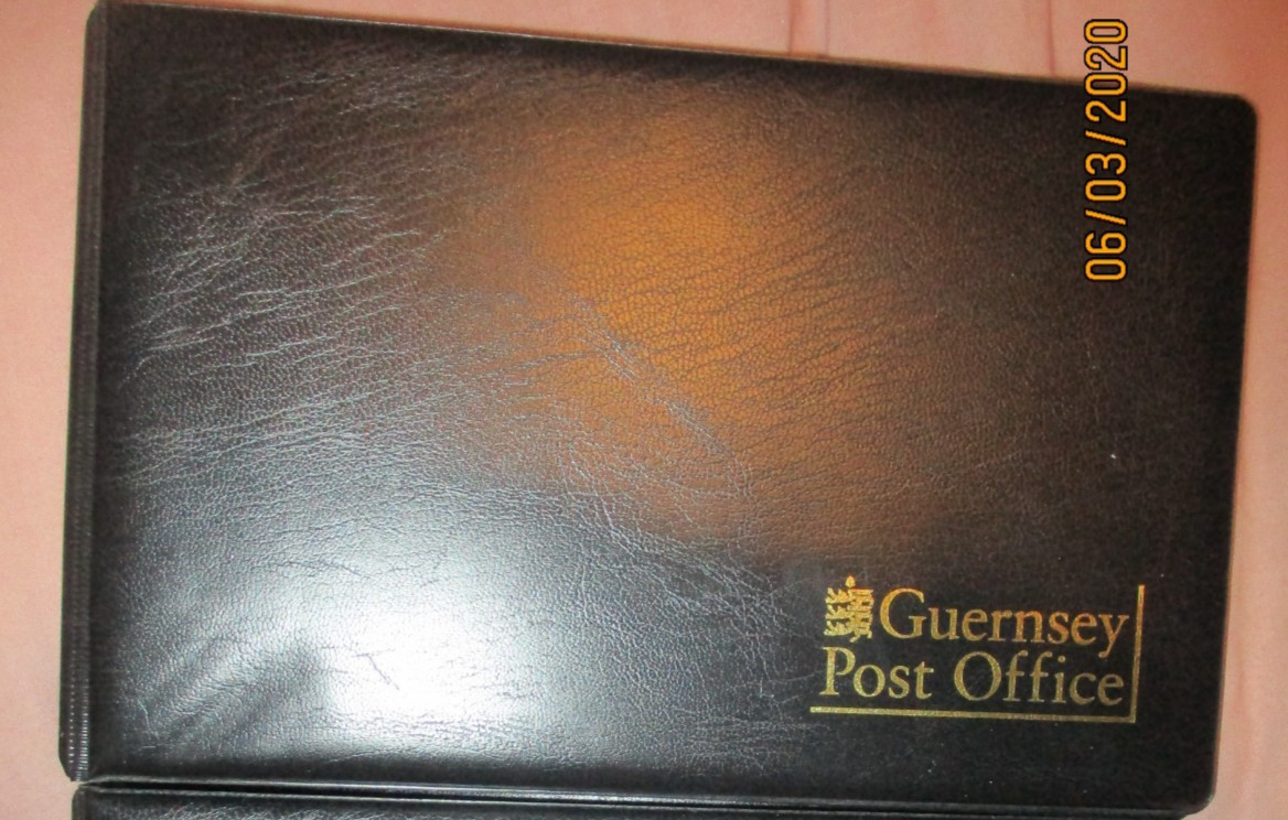 Album Containing Guernsey Post Office Mint Stamp with 17   Presentation Packs