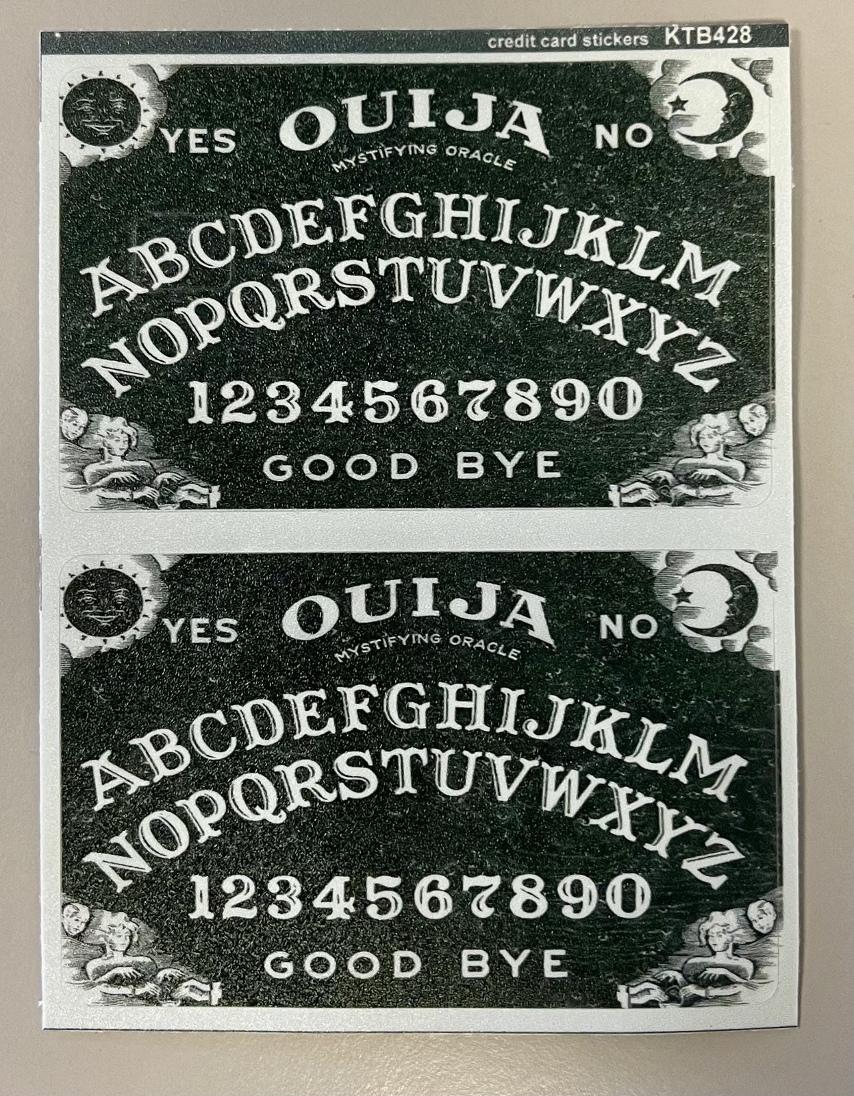 OUIJA CREDIT CARD STICKER - SET OF 2 - 1 SOLID, 1 WITH CHIP READER PUNCH OUT