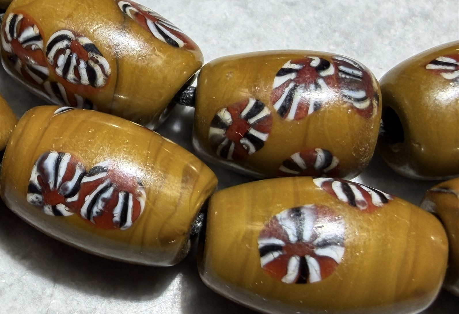 Strand of wound Indonesian beads w murrine. 