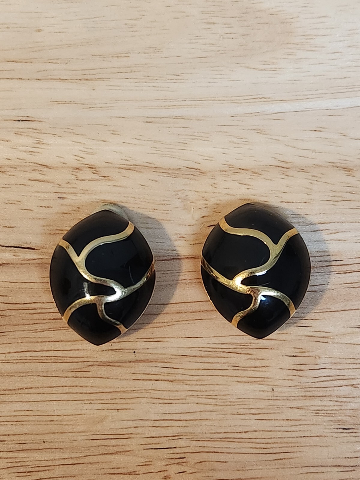 Vintage Black Enamel And Gold Tone Large Almond Shaped Clip On Earrings