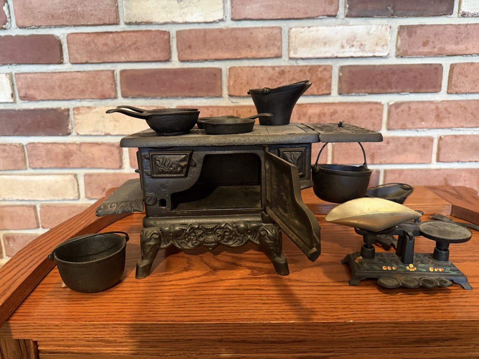 Vintage Cast Iron Toy Kitchen Stove Set with Miniature Pots and Accessories