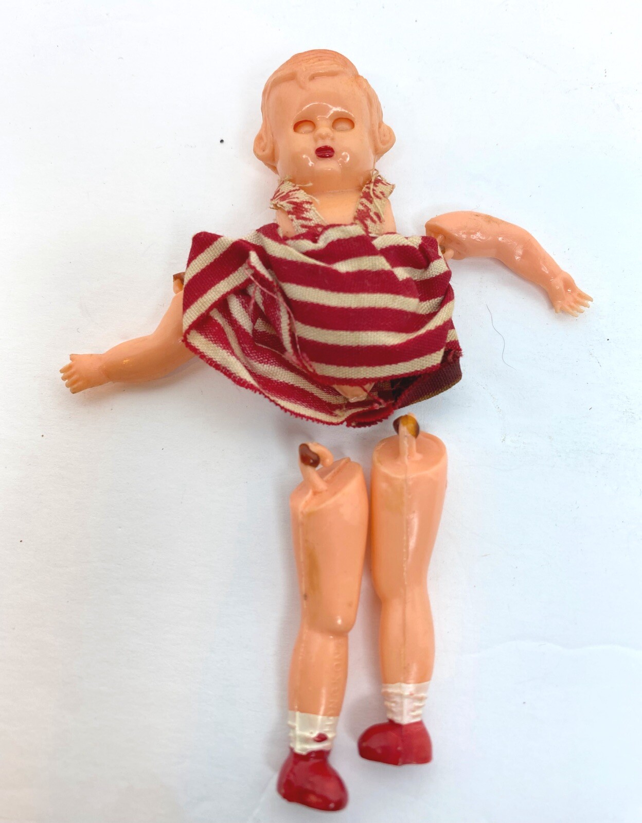 small vintage plastic doll blinking eyes from the 50s