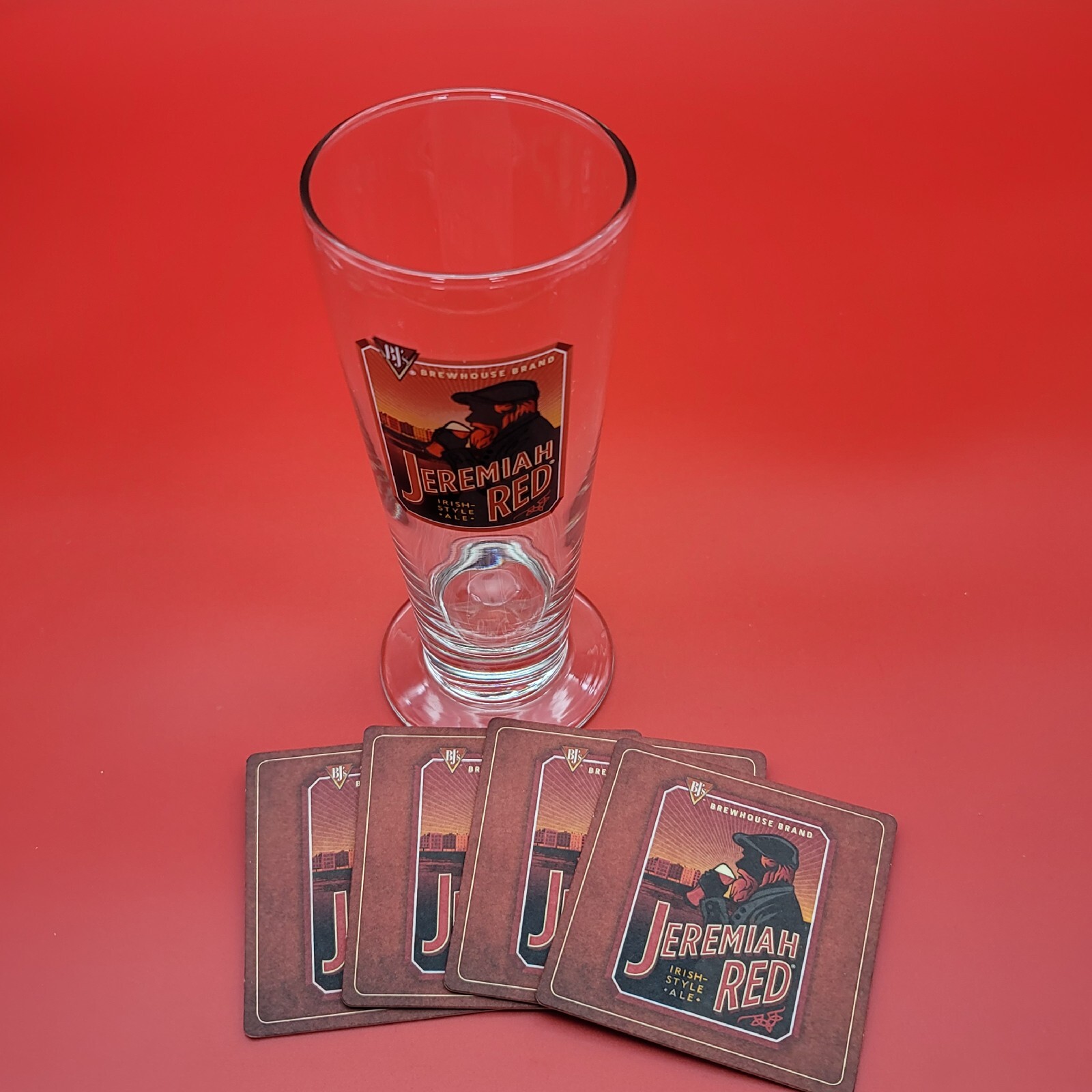 BJ's Brewhouse Pilsner Beer Glass 4 Matching Paper Coasters Jeremiah Red Mancave