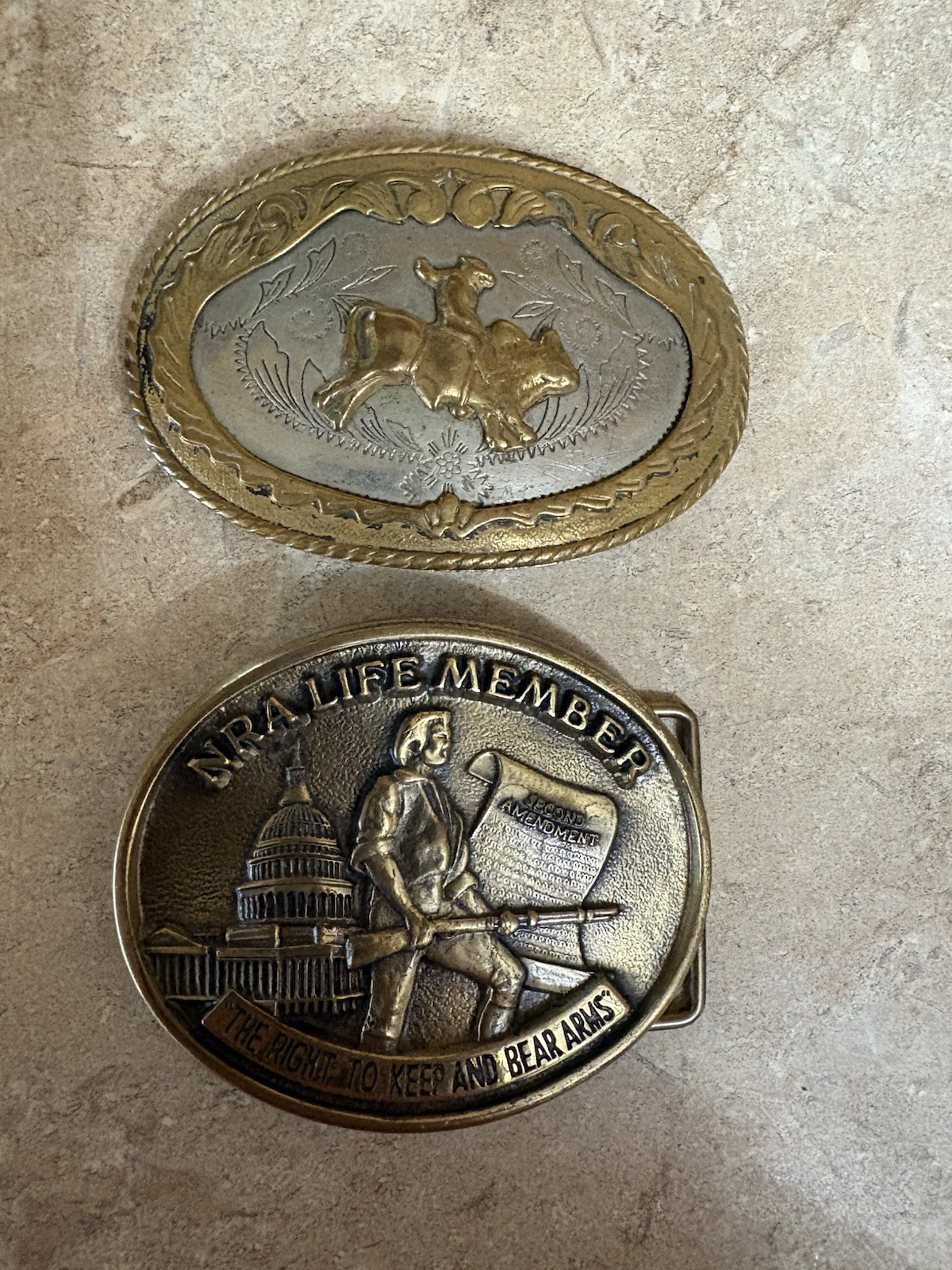 2 Belt Buckles One Solid Brass. OneBrass And Nickel Silver. NRA And Rodeo Design
