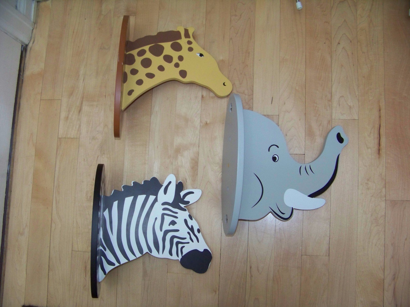 Three animal clothes wall hangers elephant giraffe zebra 11" tall 10" deep 6" 