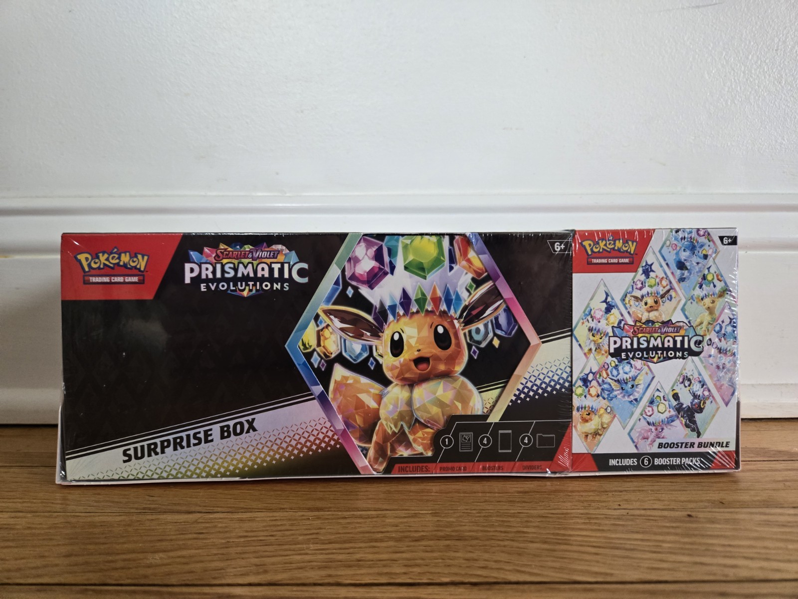 Pokémon Prismatic Evolutions Booster Bundle & Surprise Box Sealed - Sam's Club
