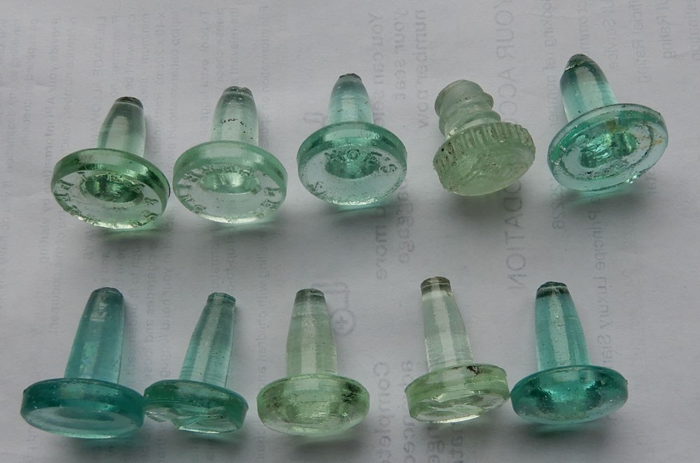 Group of 10 glass bottle stoppers, Lea & Perrins, Gartons, Hoe's sauce  c1900-20