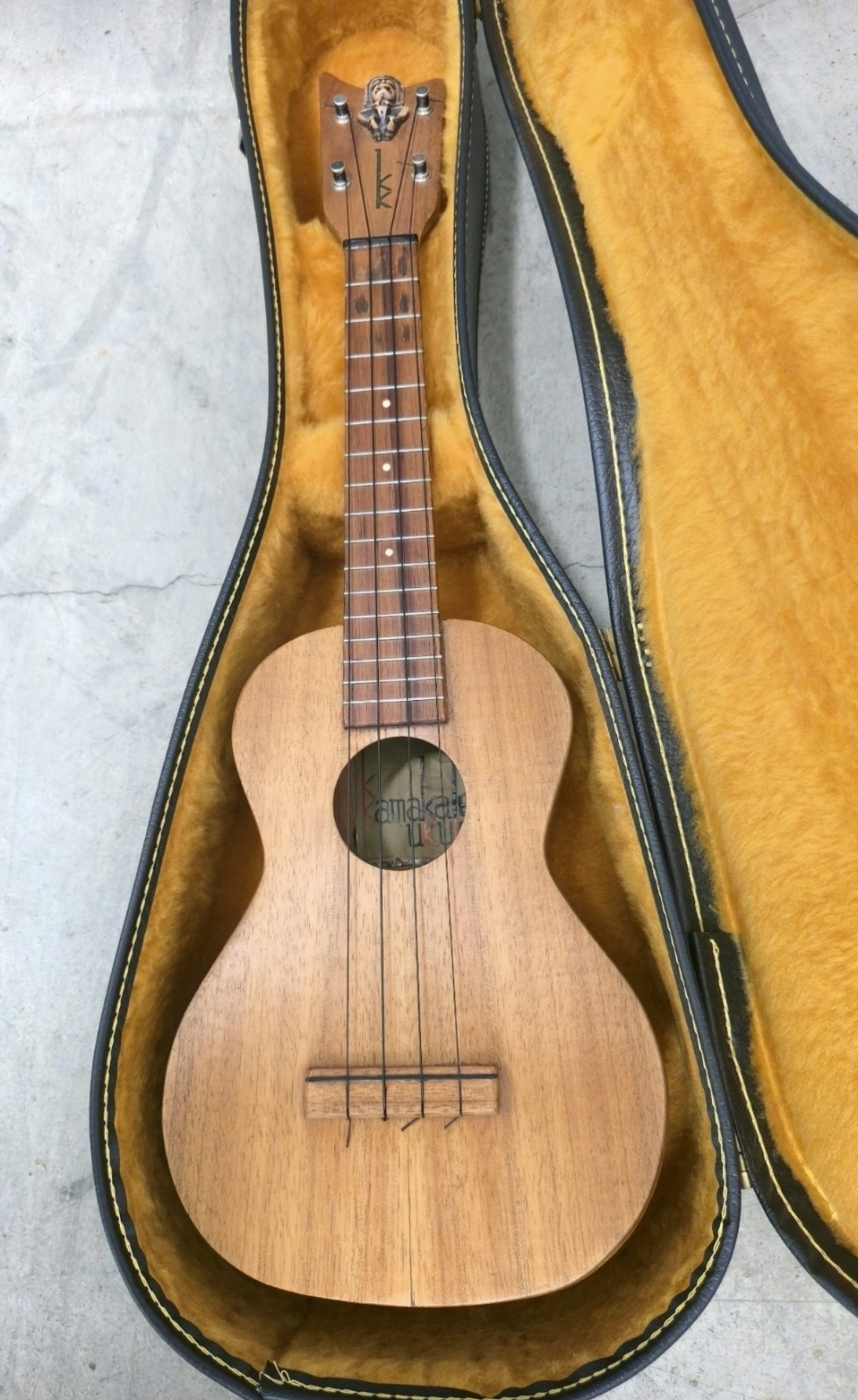 Kamaka Gold label concert rare tiki on head stock 