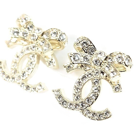 Item CHANEL Ladies Coco Mark Earrings Gold CC Ribbon Coco Mark