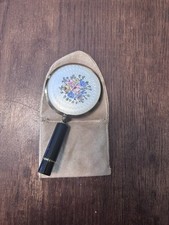 Vintage Round 2.5" mirror with attached lipstick folds with original pouch