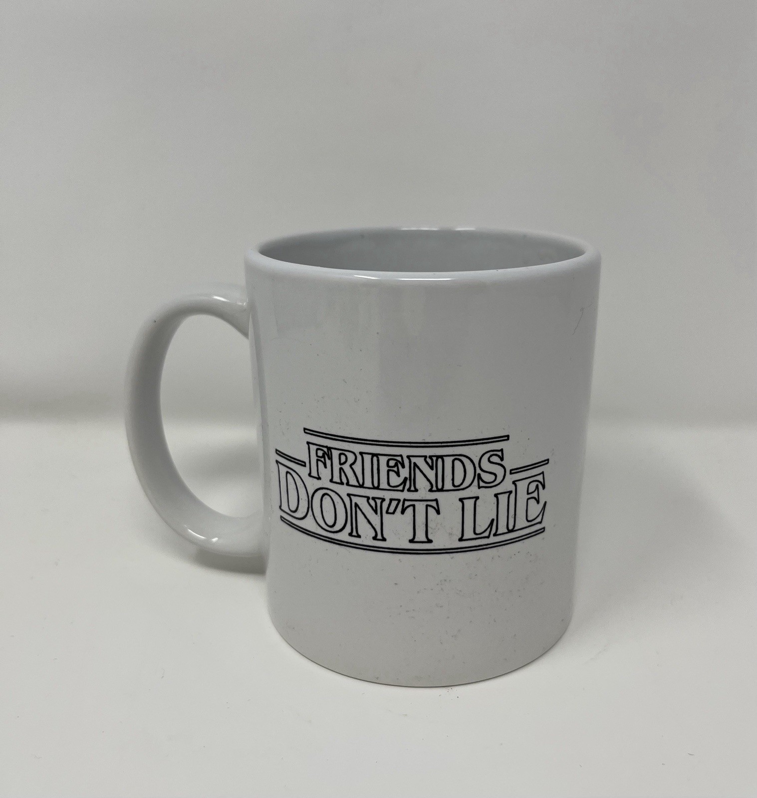 Netflix Stranger Things Eleven Friends Don’t Lie Classic White Mug