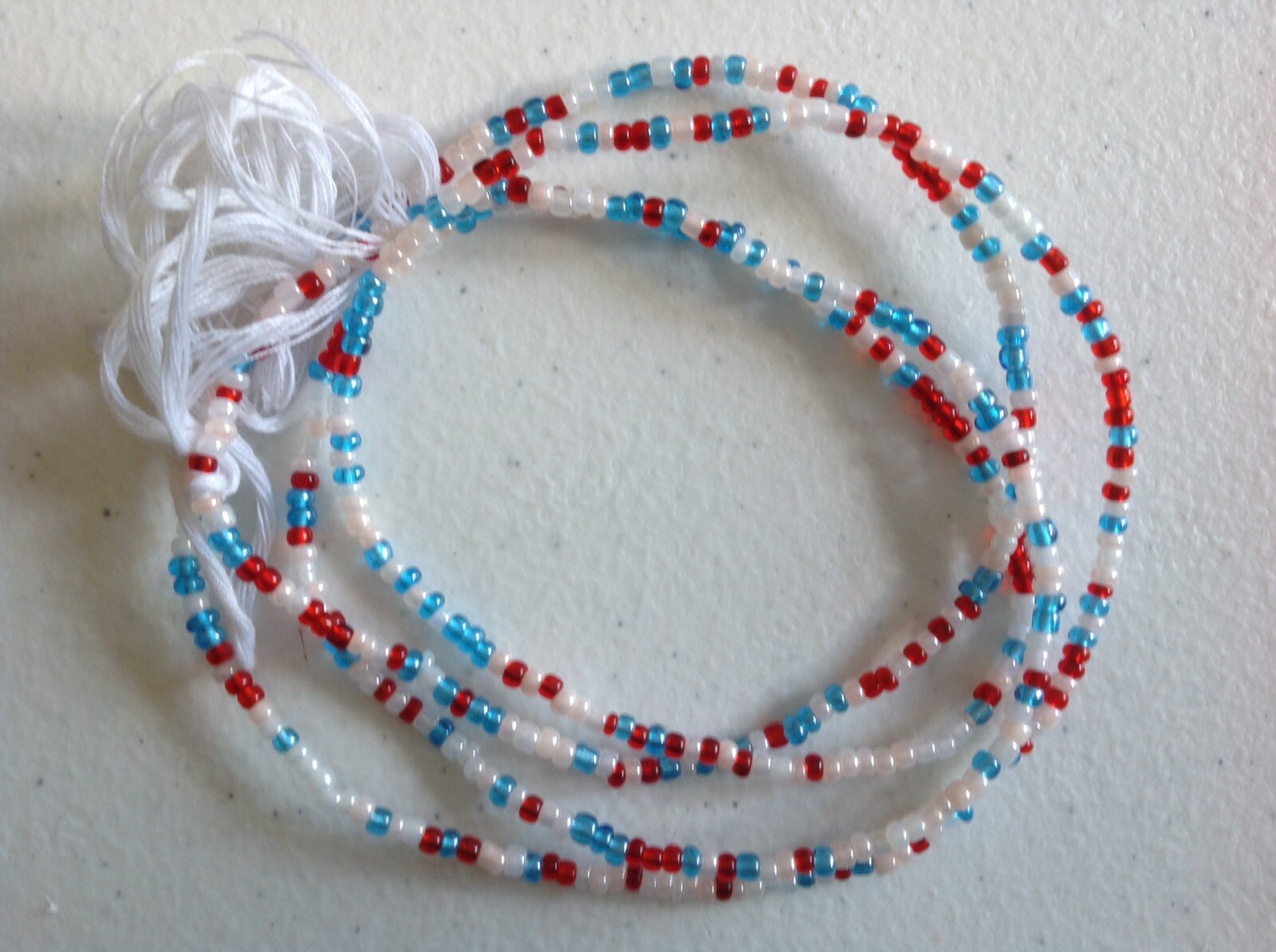 LADIES AND GIRLS BEADS MULTI COLORED AFRICAN WAIST BEADS 42 INCHES LONG.