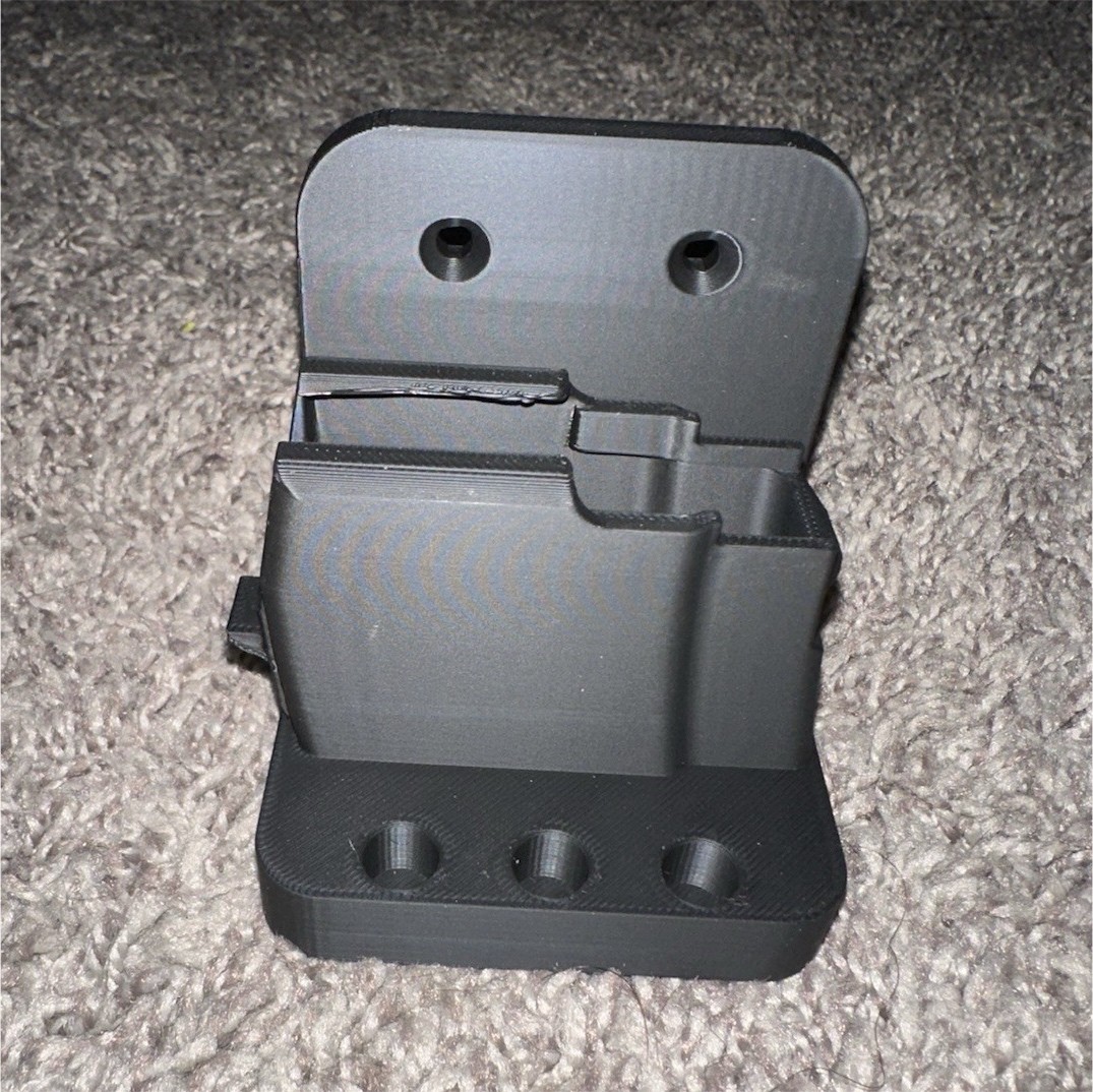 Black wall mounted 7.62 rifle wall mount with magazine holder