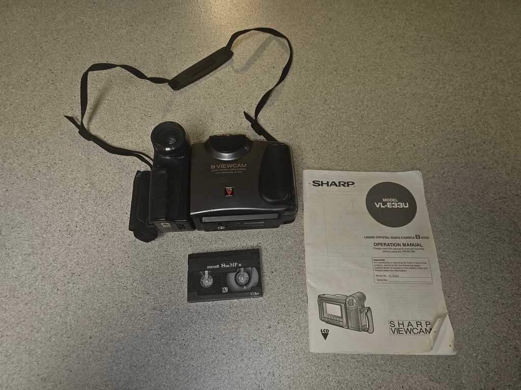 Sharp VL-E33U 8mm Viewcam Liquid Crystal Video CAMCORDER. NEEDS A LAMP ONLY ISSU