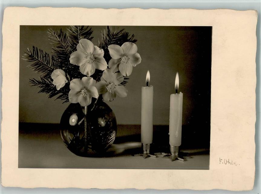 40067155 - Christmas Flowers and Burning Candles