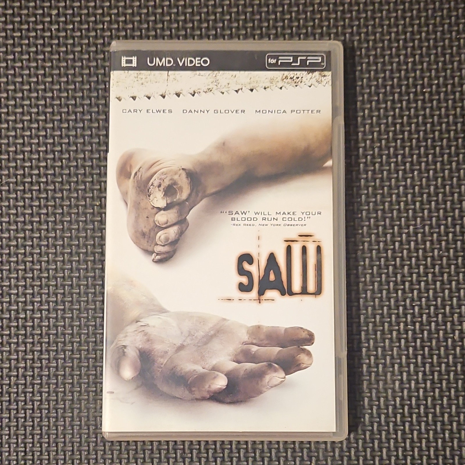 Saw UMD Video for PSP, Horror, R, Cary Elwes, Danny Glover, Monica Potter
