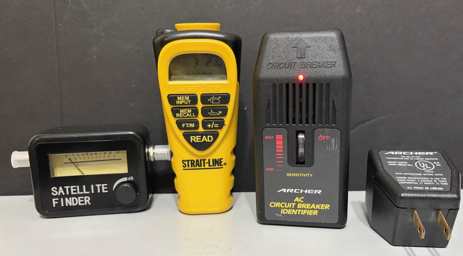 SMALL TOOL PACKAGE. SATELLITE FINDER, STRAIT LINE LASER TAPE , BREAKER ID.