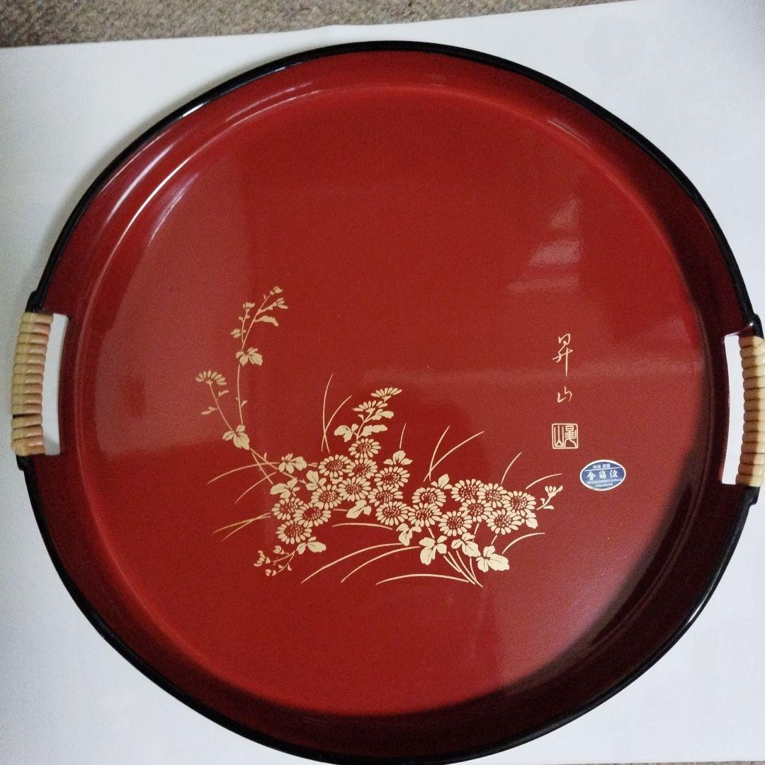 Maki-e  Large 35cm round tray with a floral pattern design in red lacquerware