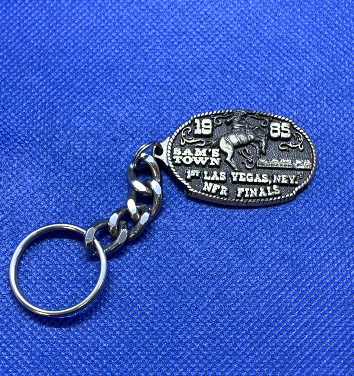 Vintage 1985 Sam's Town 1st Las Vegas , Nev. NFR Finals Keychain Cowboy Rodeo