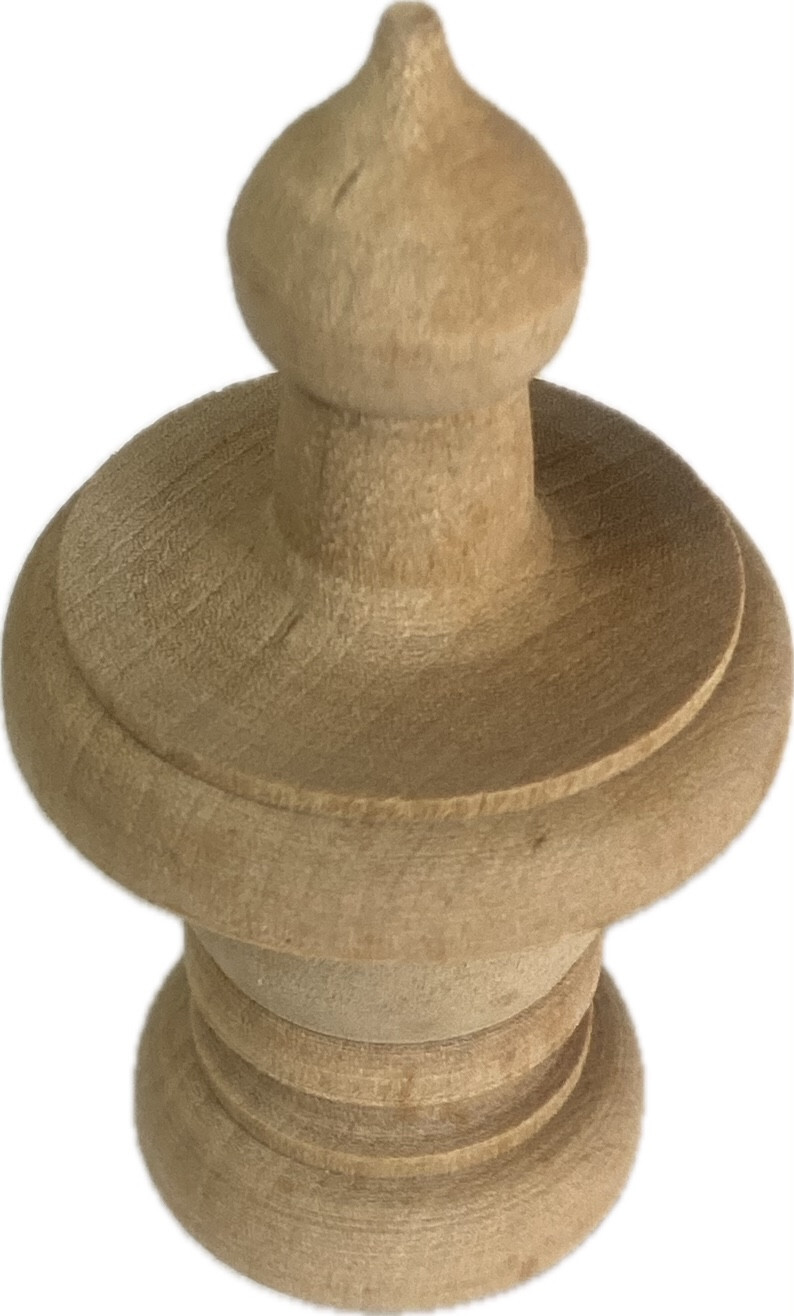 Turned wood.  wooden ornament-finial clock