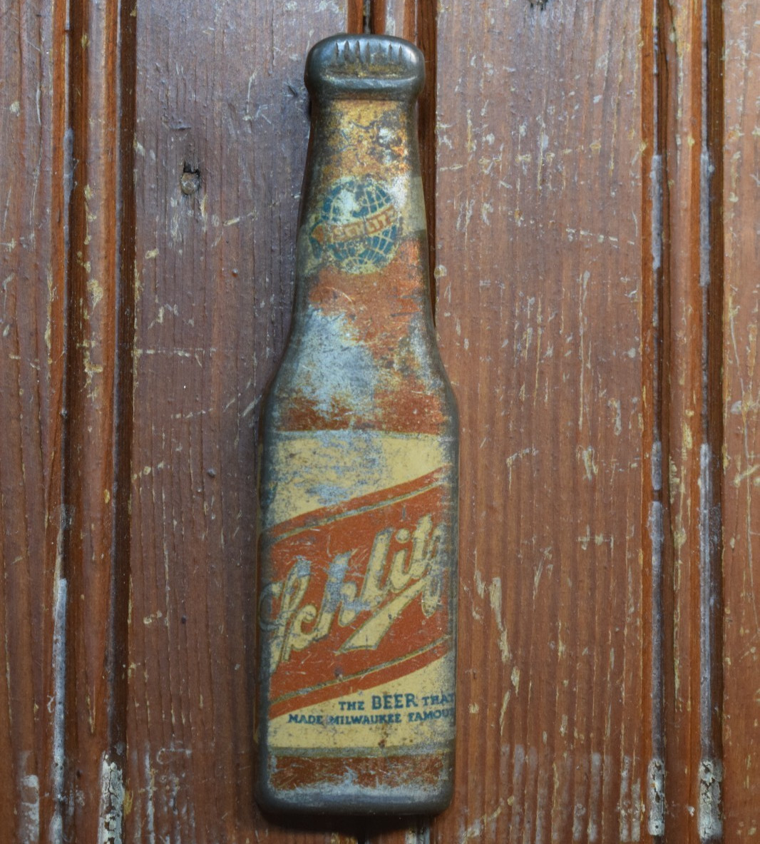 SCHLITZ FIGURAL BEER BOTTLE OPENER SIGN LITHOGRAPHED STAMPED METAL VINTAGE 1940s