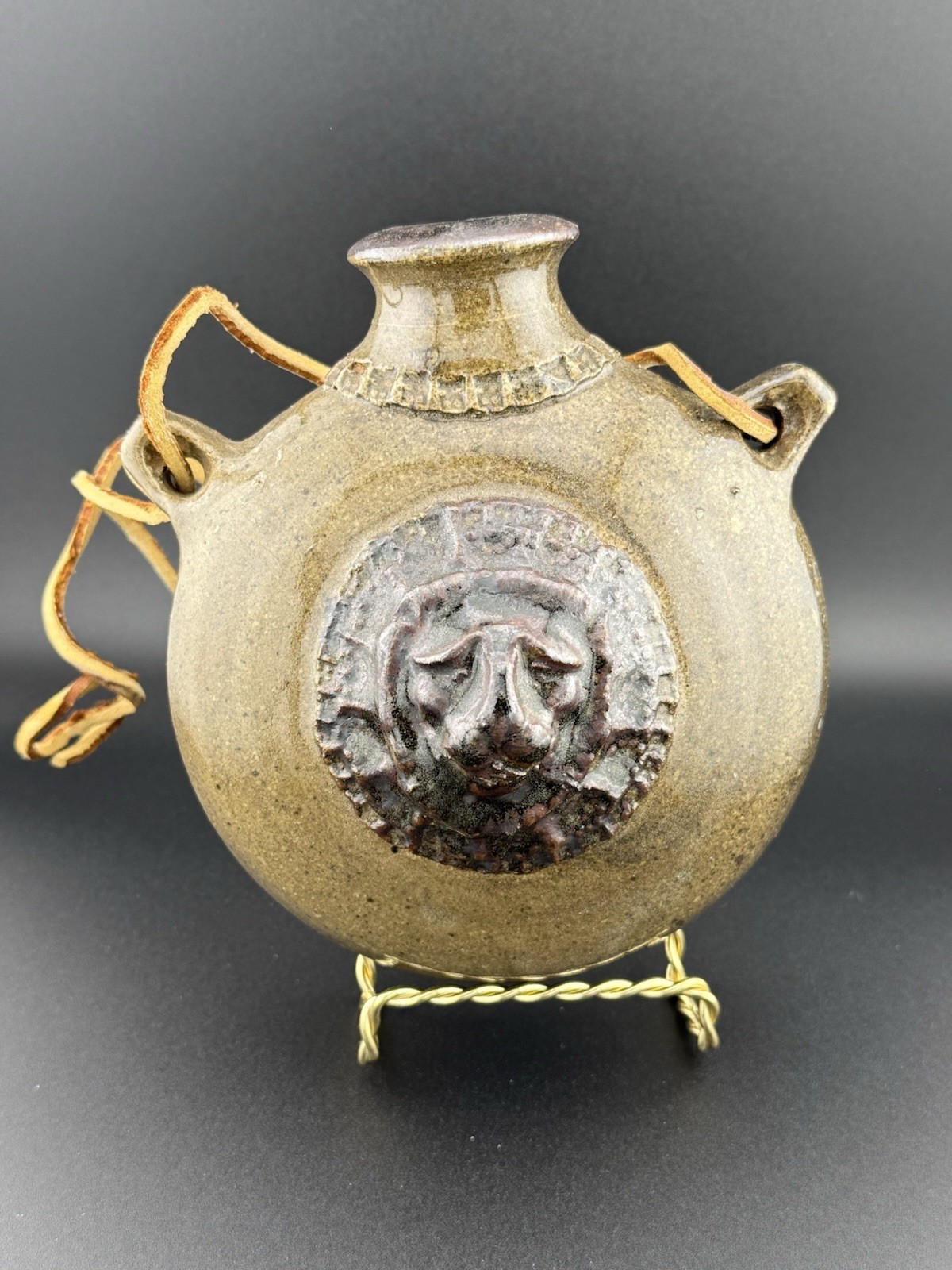 Art Pottery Earthenware Canteen Glazed, Leather Straps Raised LION FACE 
