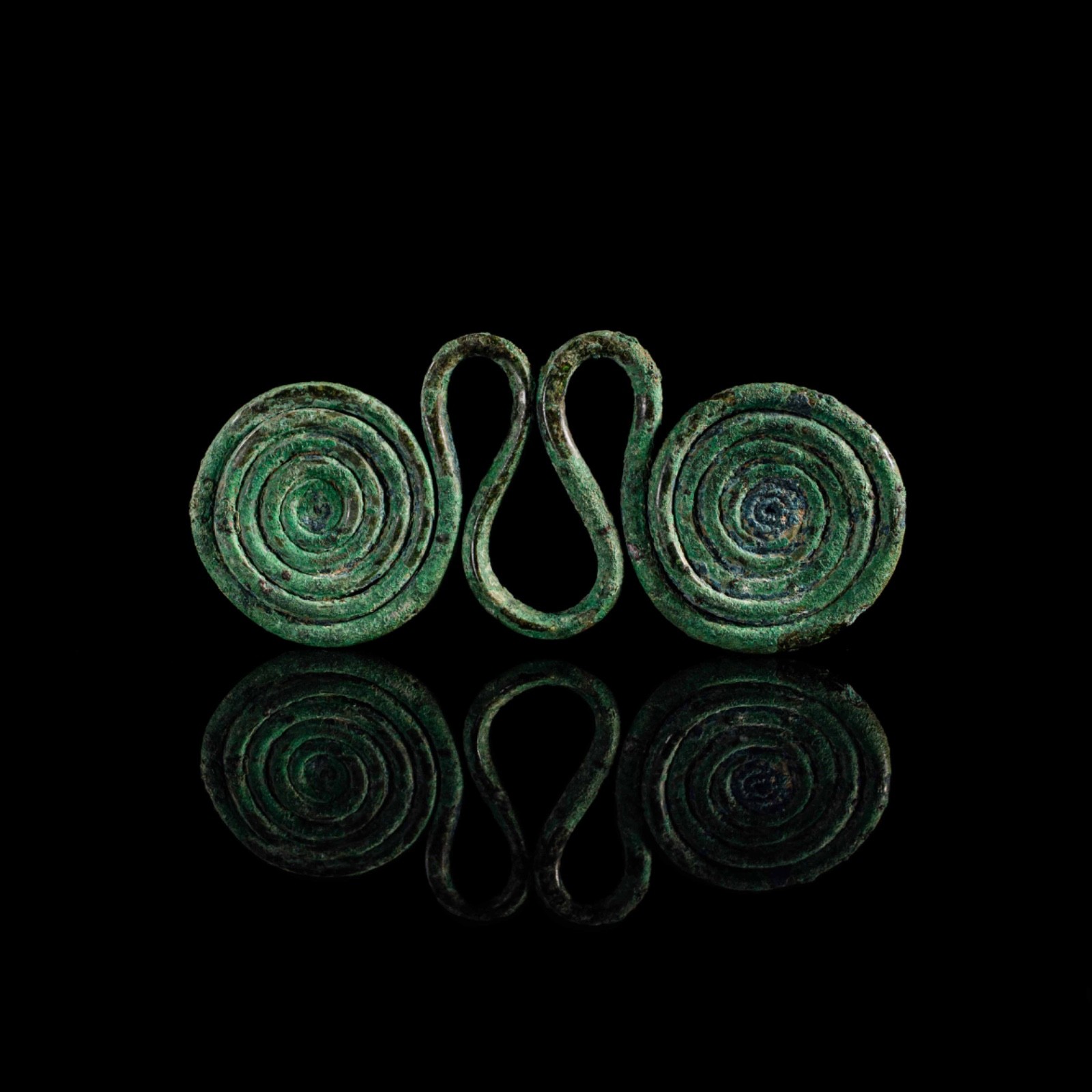 Bronze pendant with double spiral