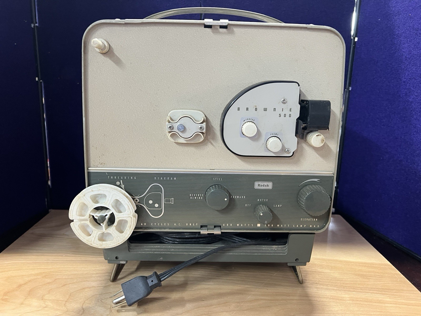 Brownie 500 projector with 4 Movies. 