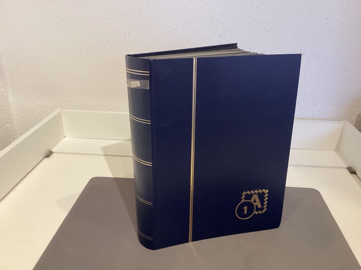 Stamp album, slip-in album, DIN A4, 64 pages, black, used